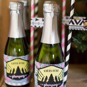 Girls Gone Glamping Champagne bottles and straw flags by Elva M Design Studio