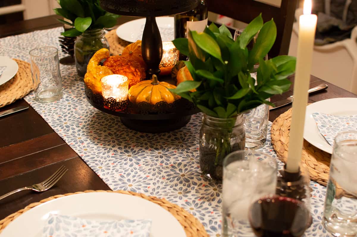 Add Fall greenery to a mason jar for a simple and lush centerpiece