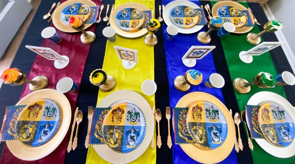 Hogwart's House Harry Potter table with runners for each house colors.