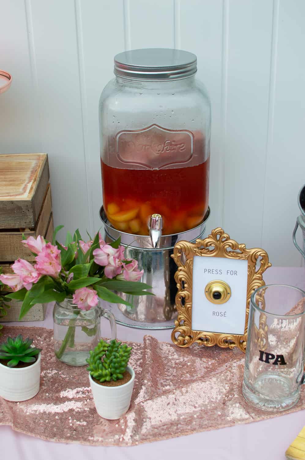 Serve Rosé wine sangria in a large mason jar dispensera 
