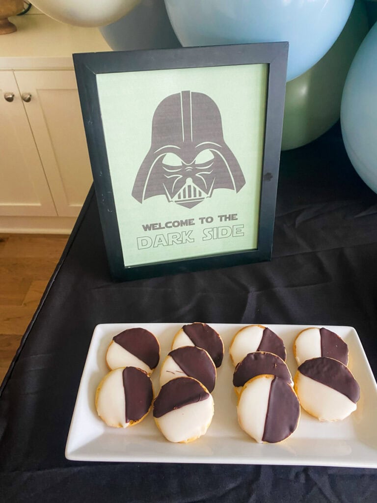 Welcome to the Dark Side framed Darth Vader printable sign on sage green background with black and white cookies