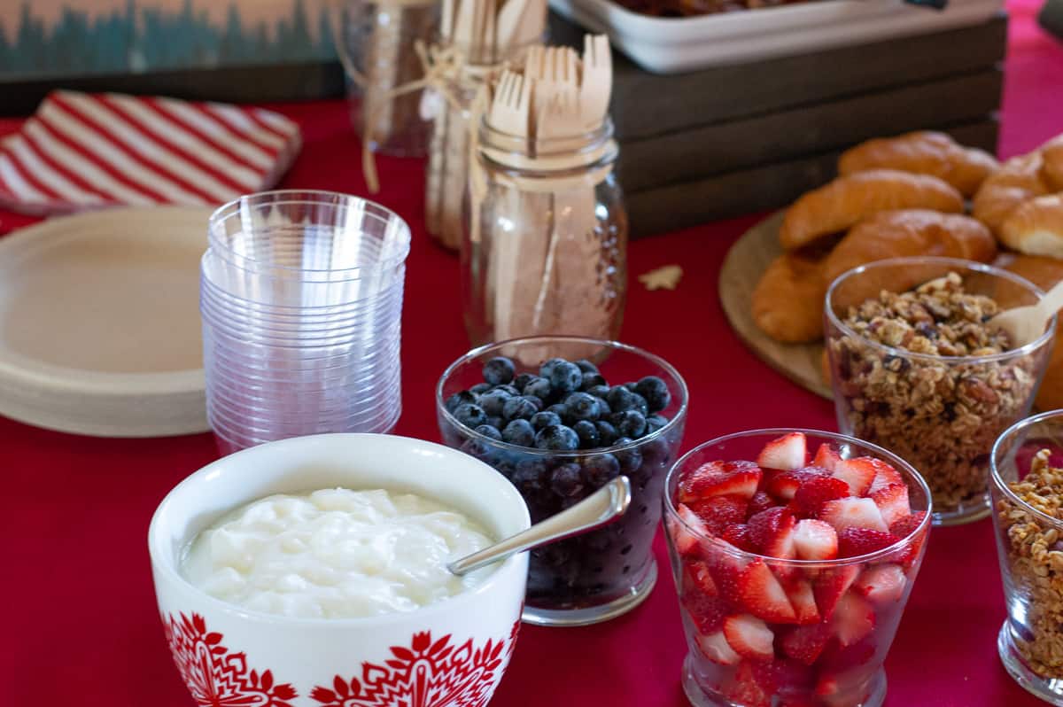 Yogurt parfait bar with toppings served up in little bowls